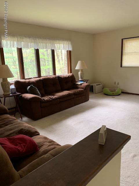 1226 Kroucher Road Stroudsburg, PA 18360 - Photo 5 of 28 a living room with furniture and window