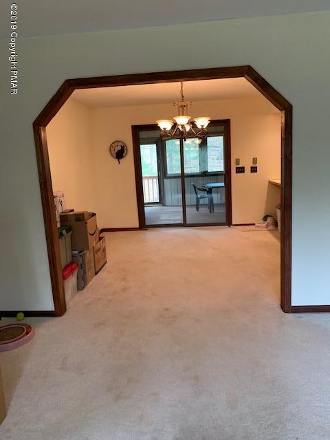1226 Kroucher Road Stroudsburg, PA 18360 - Photo 9 of 28 wooden floor in an empty room with a window