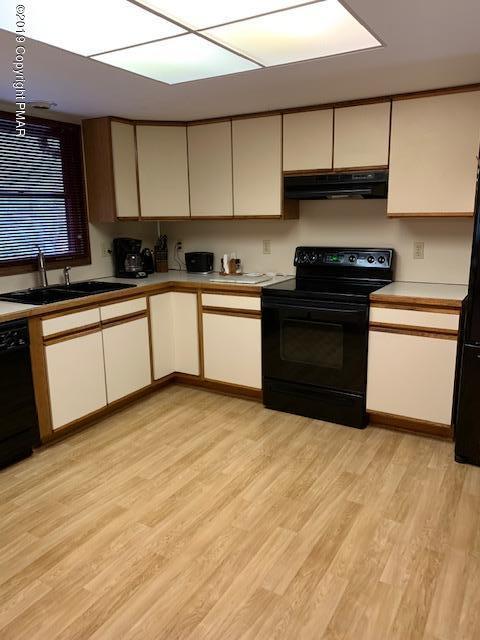 1226 Kroucher Road Stroudsburg, PA 18360 - Photo 10 of 28 a kitchen with stainless steel appliances granite countertop a stove a sink and a microwave