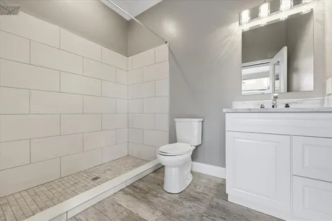 a living room with lots of furniture and window