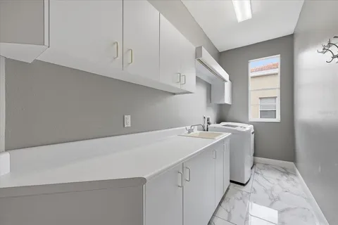 a bedroom with a bed dresser and a window