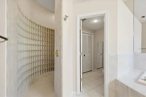 a view of a backyard with sitting area