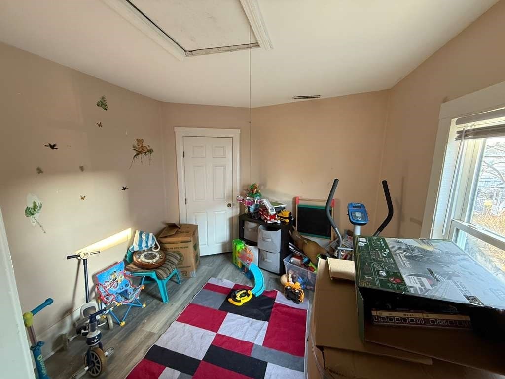 98 School Street Lowell, MA 01854 - Photo 3 of 40 a view of a workspace with furniture