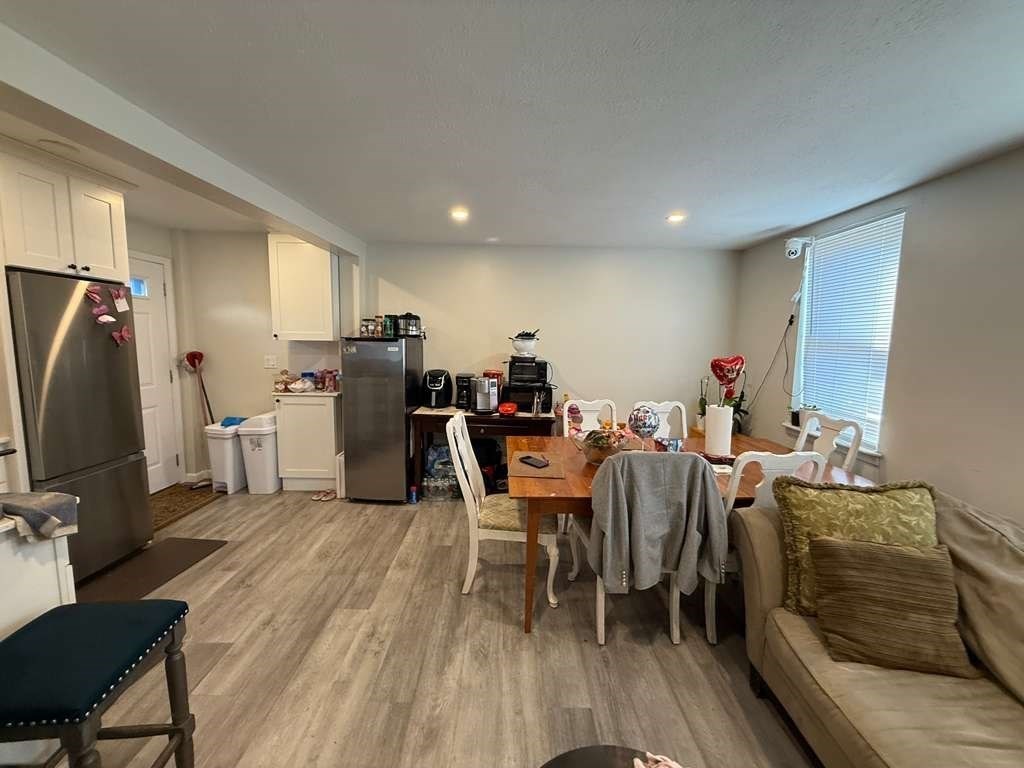 98 School Street Lowell, MA 01854 - Photo 33 of 40 a view of a dining room with furniture