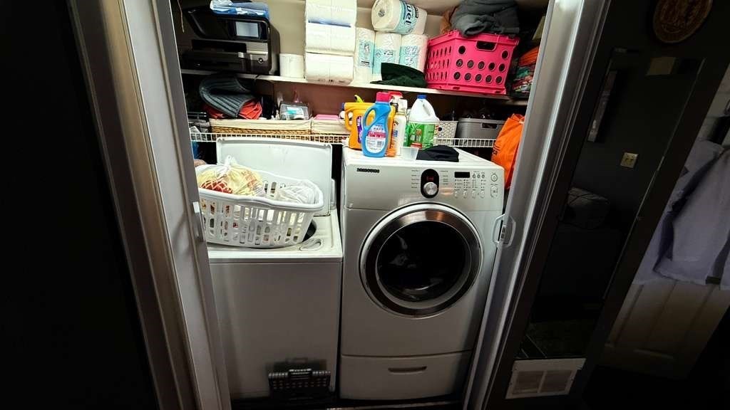 98 School Street Lowell, MA 01854 - Photo 37 of 40 a utility room with dryer and washer