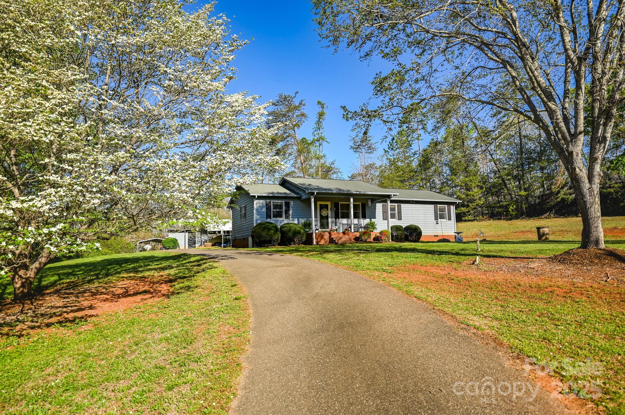 1469 Pearidge Road Bostic, NC 28018 - Photo 2 of 35 a front view of a house with a big yard