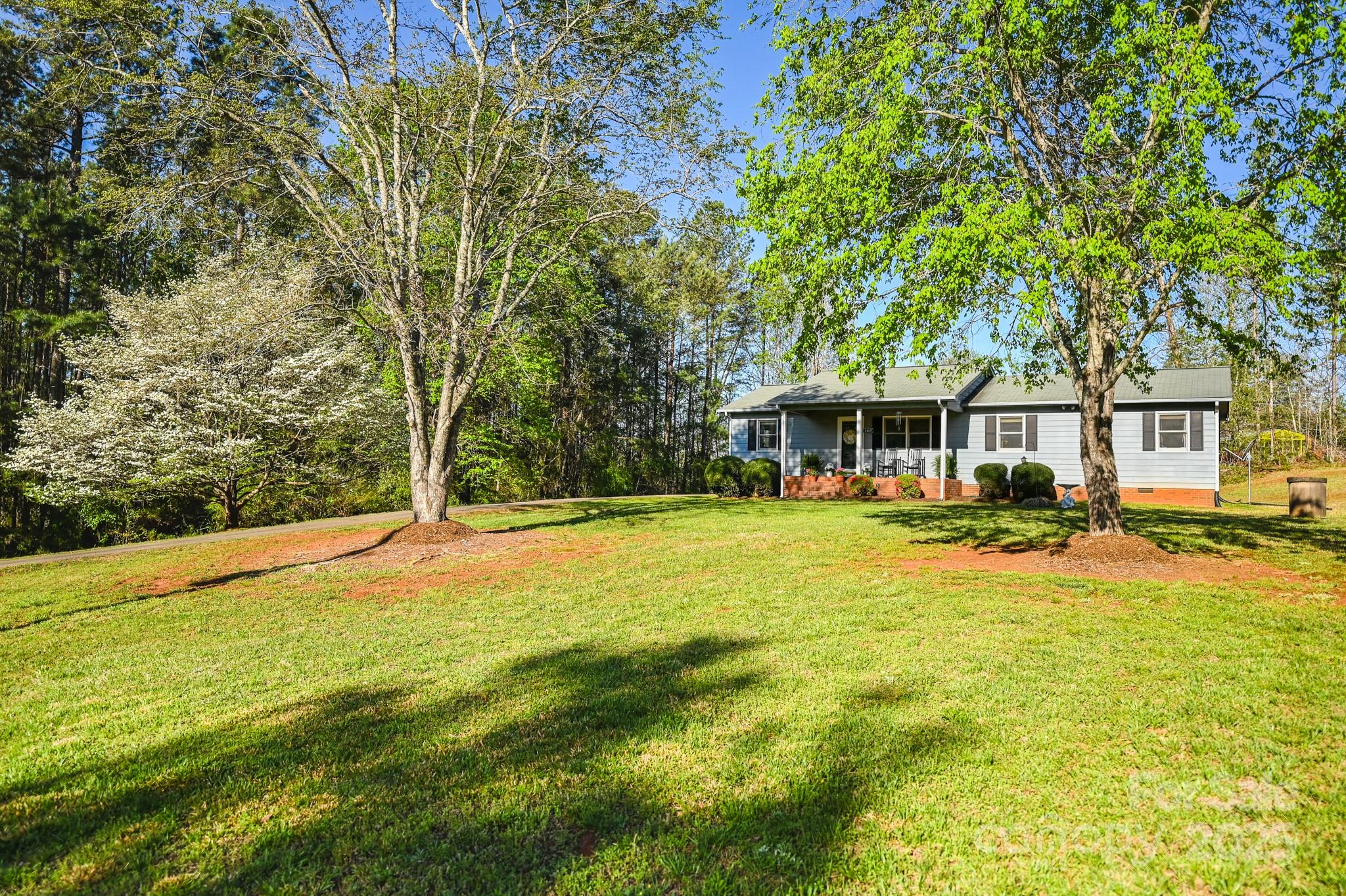 1469 Pearidge Road Bostic, NC 28018 - Photo 3 of 35 a front view of a house with swimming pool