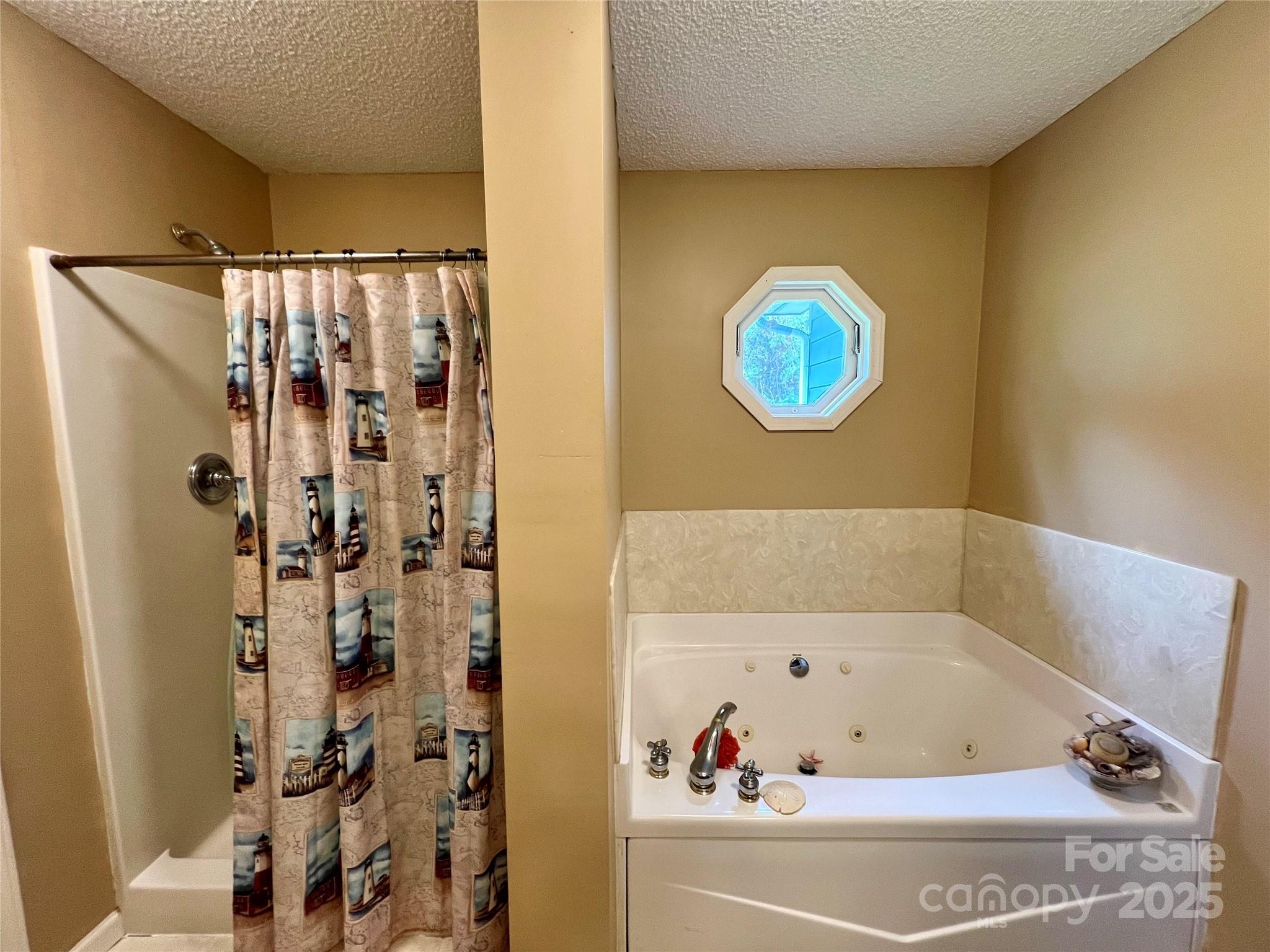 1469 Pearidge Road Bostic, NC 28018 - Photo 31 of 35 a bathroom with a bathtub and shower