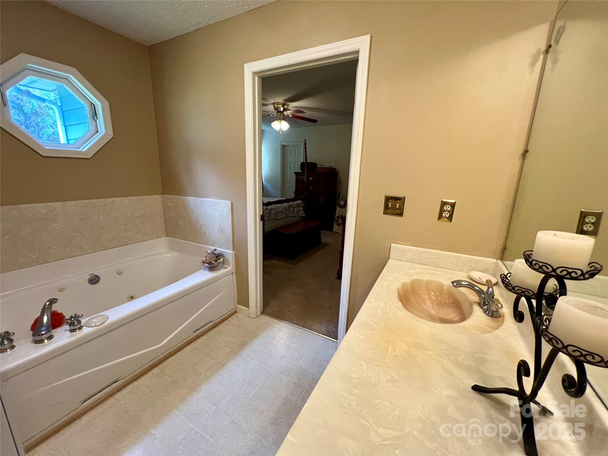 1469 Pearidge Road Bostic, NC 28018 - Photo 32 of 35 a en suite bathroom with a bathtub and a shower