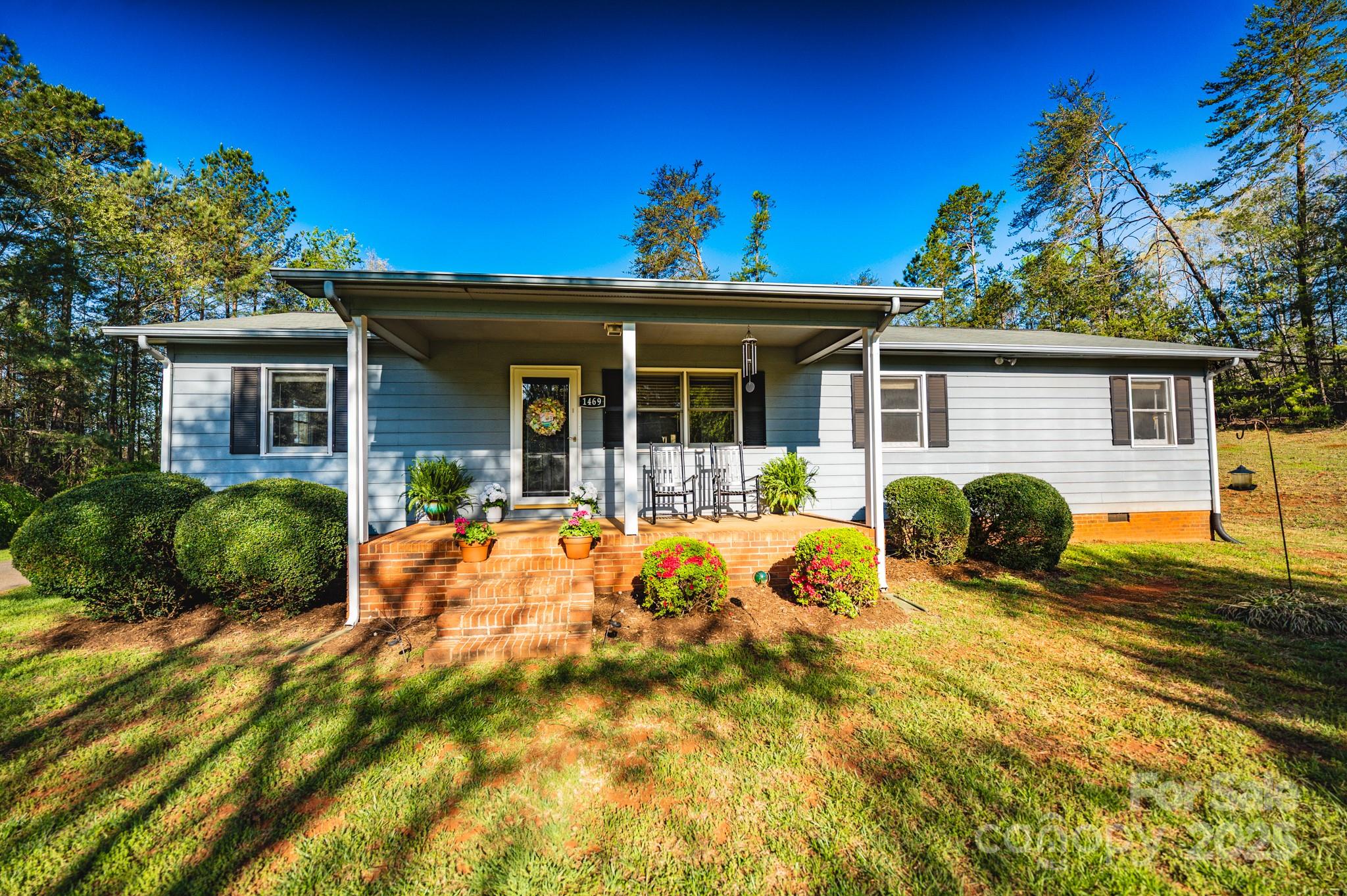 1469 Pearidge Road Bostic, NC 28018 - Photo 5 of 35 a view of a house with pool and a yard