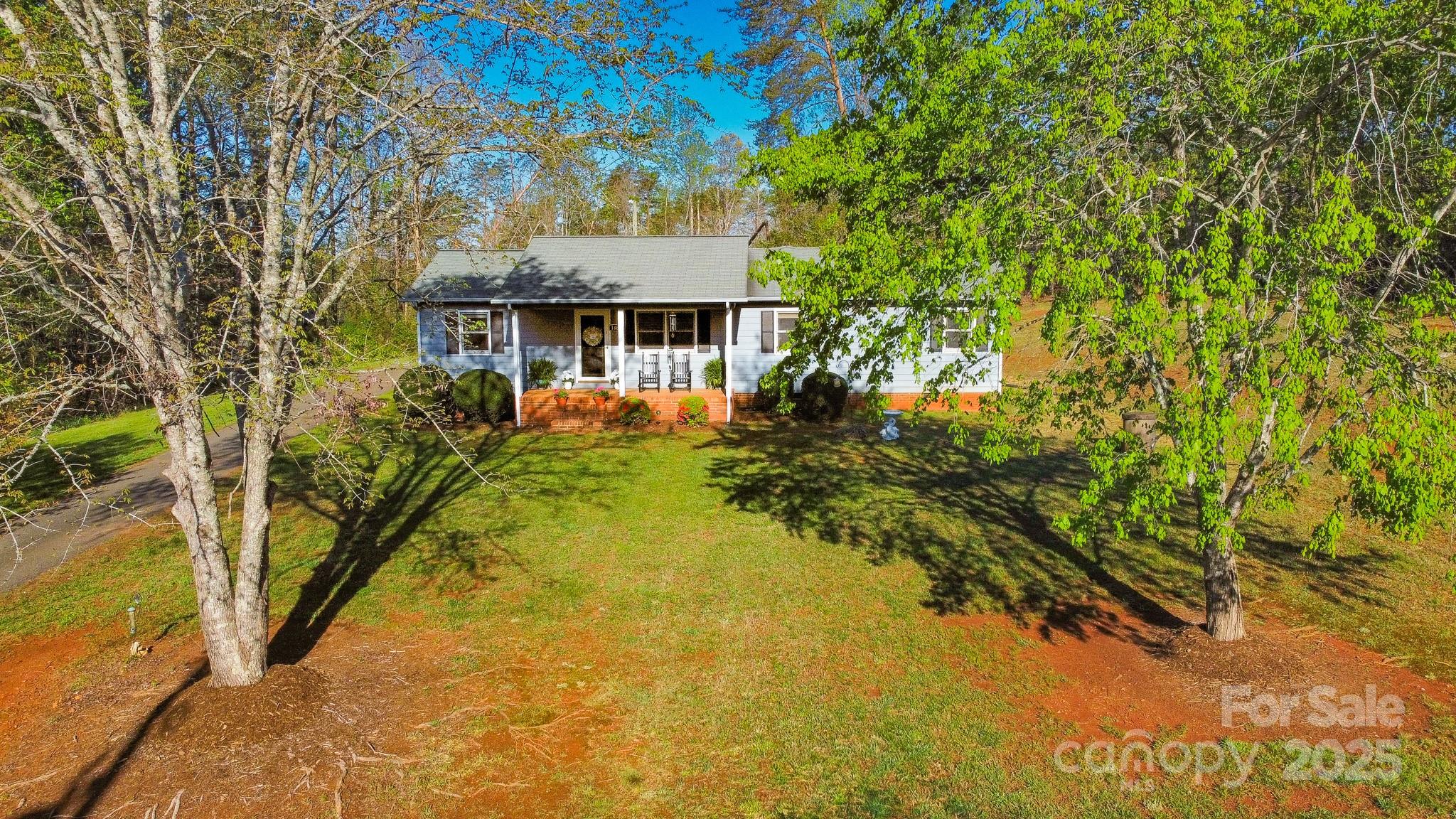 1469 Pearidge Road Bostic, NC 28018 - Photo 8 of 35 a front view of a house with a yard