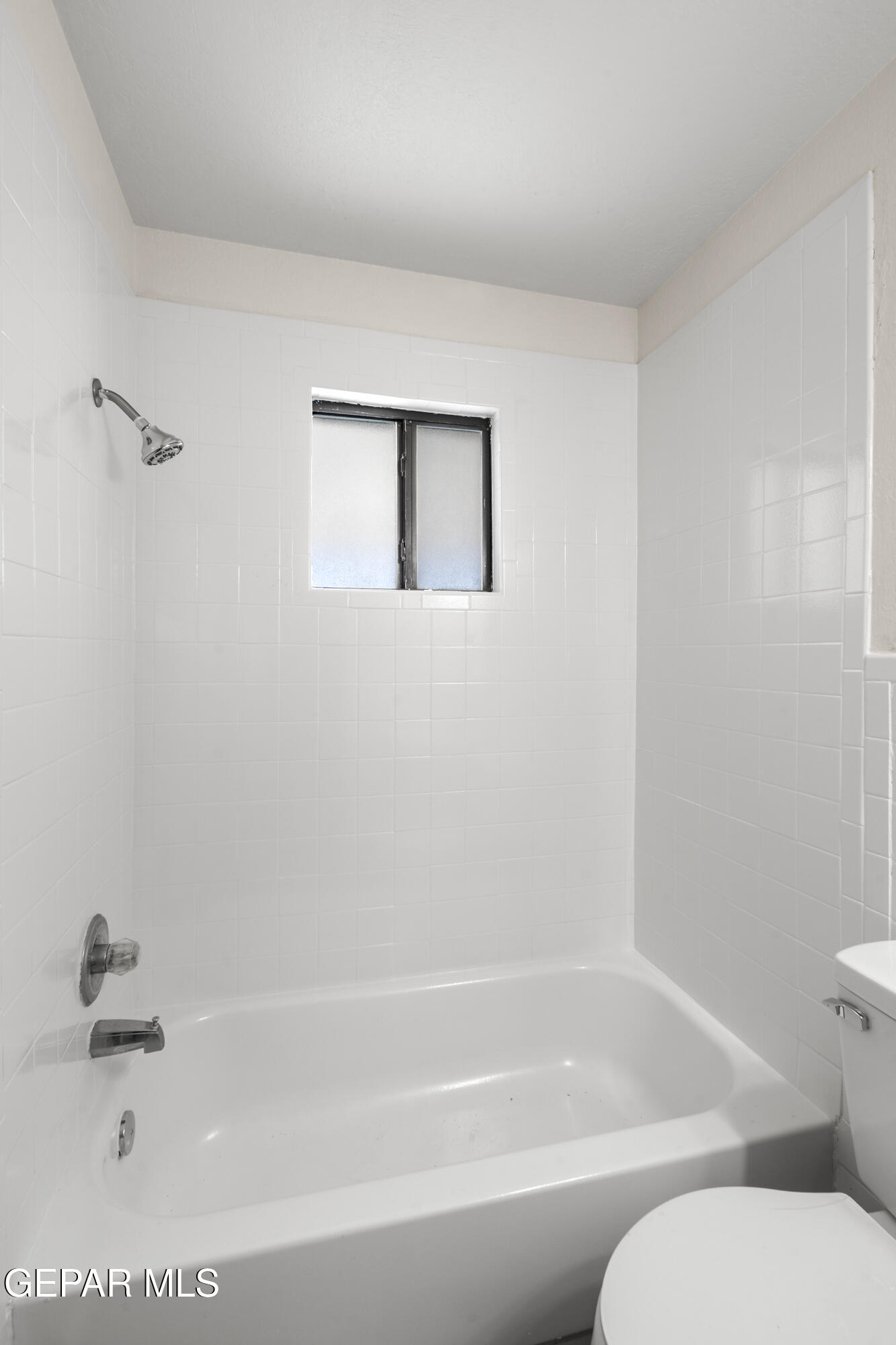 10341 Whyburn Street El Paso, TX 79924 - Photo 11 of 22 a bathroom with a bathtub and toilet