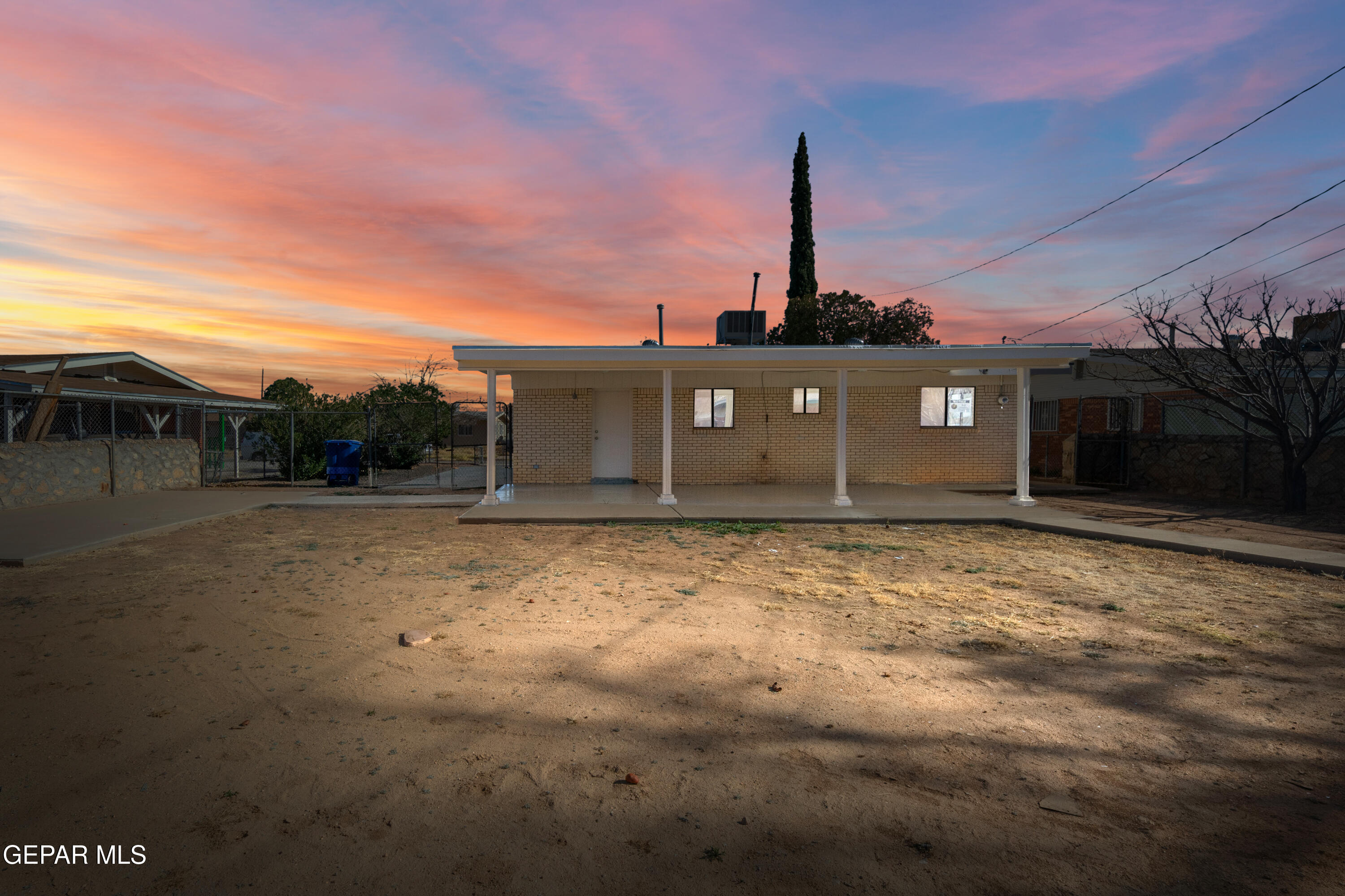 10341 Whyburn Street El Paso, TX 79924 - Photo 19 of 22 a view of a house with a yard