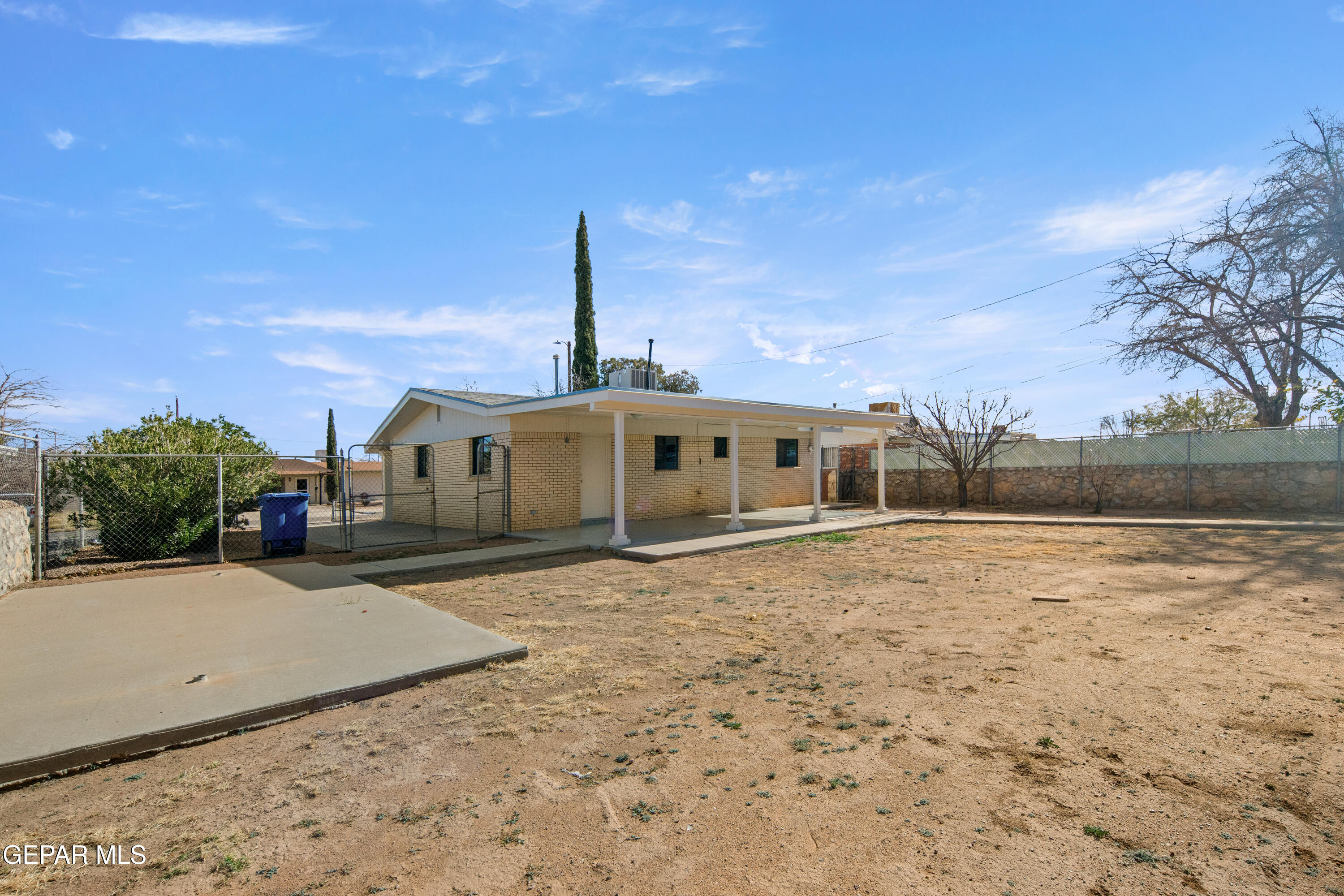 10341 Whyburn Street El Paso, TX 79924 - Photo 22 of 22 a front view of a house with a yard