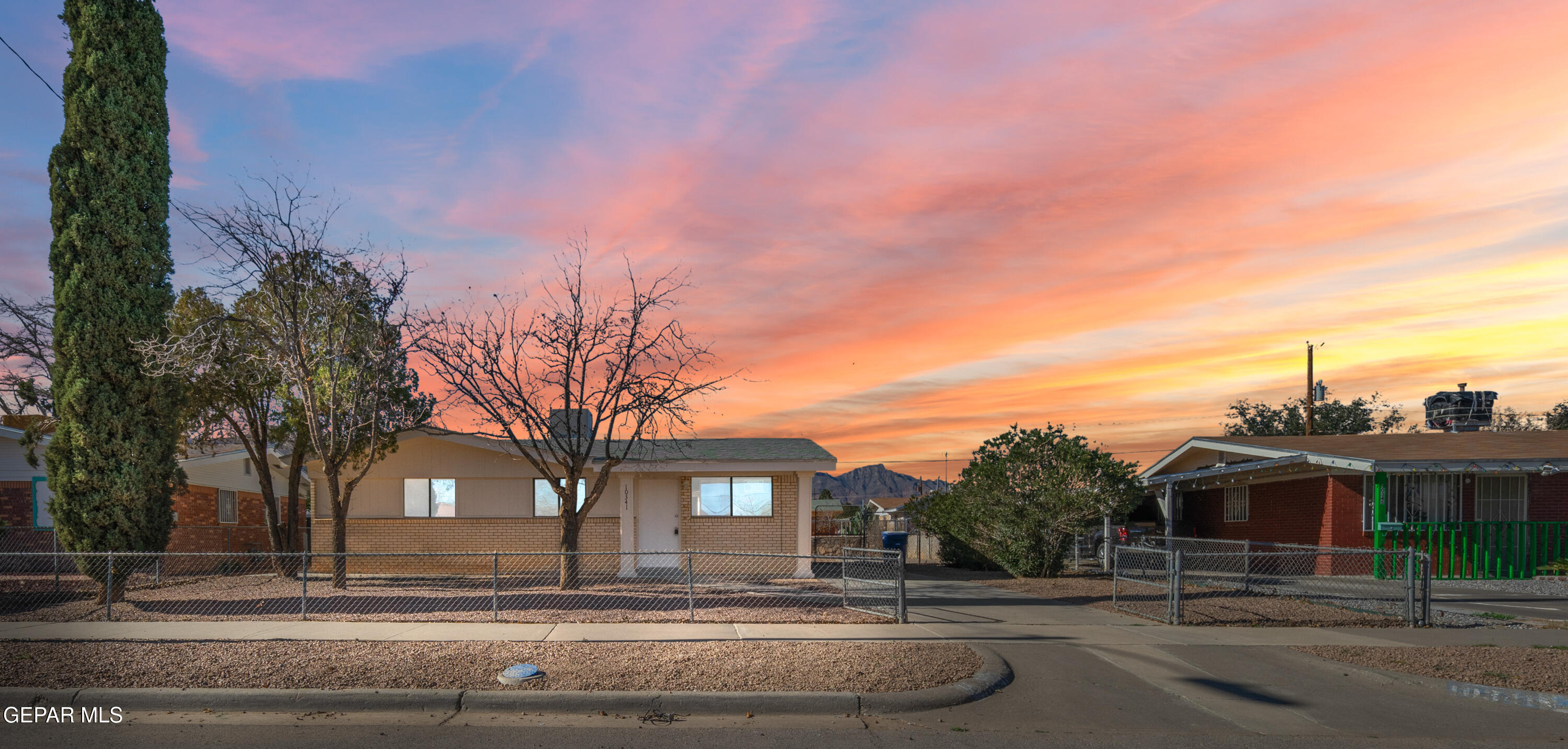 10341 Whyburn Street El Paso, TX 79924 - Photo 3 of 22 a view of a house with a yard