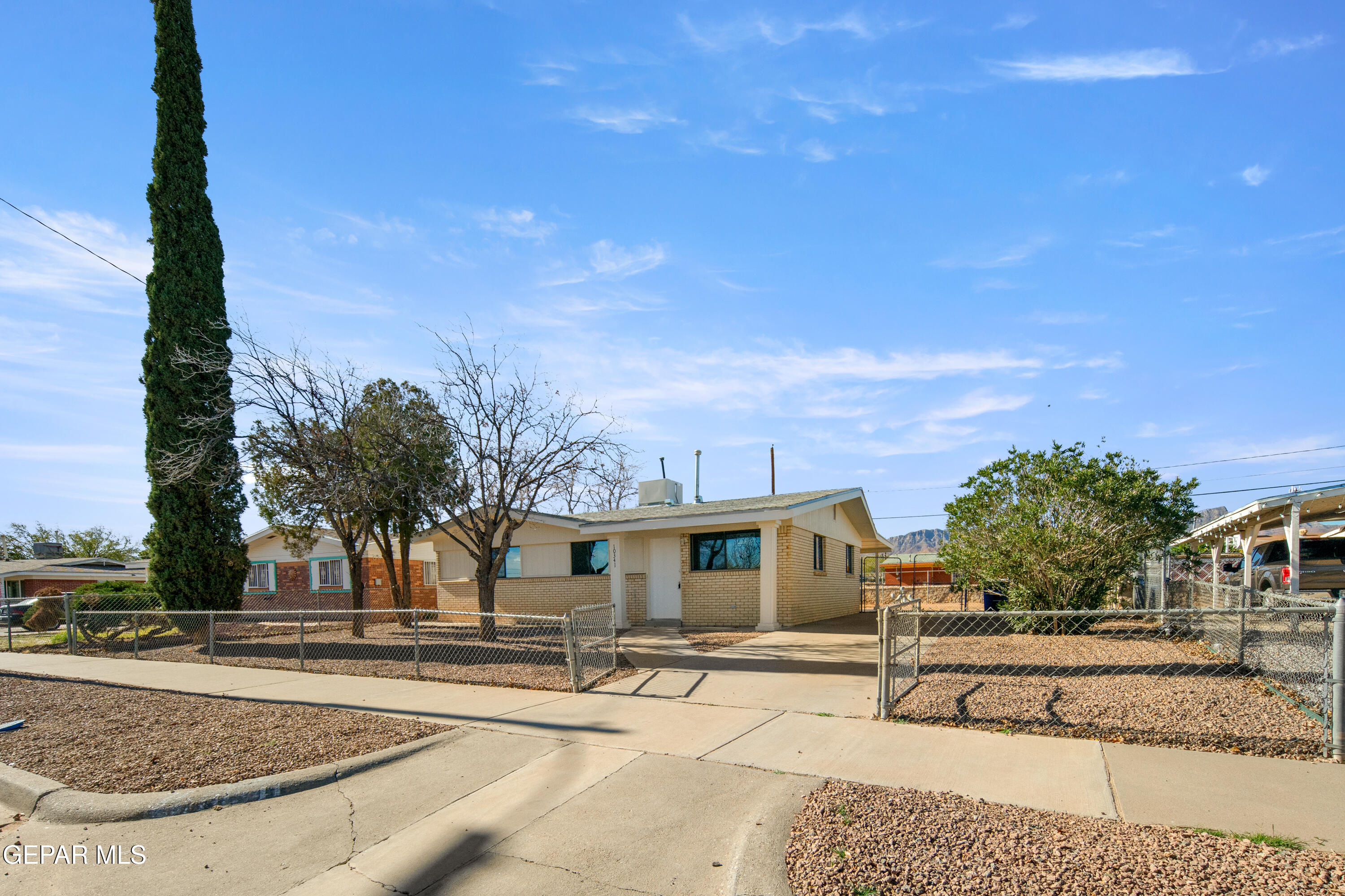 10341 Whyburn Street El Paso, TX 79924 - Photo 4 of 22 a view of a patio with swimming pool