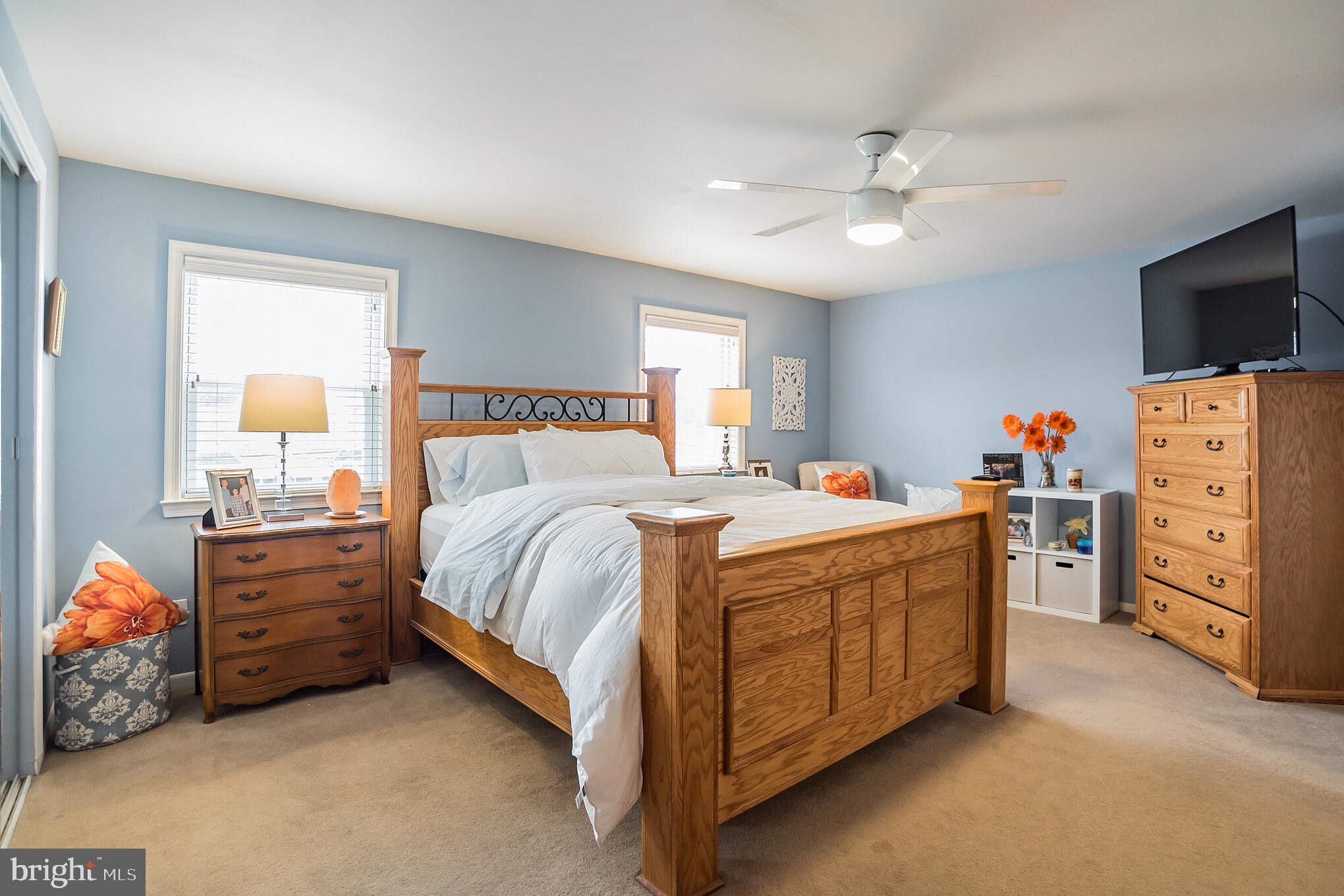 12817 Cabell Road Philadelphia, PA 19154 - Photo 13 of 30 a bed room with a bed and a television