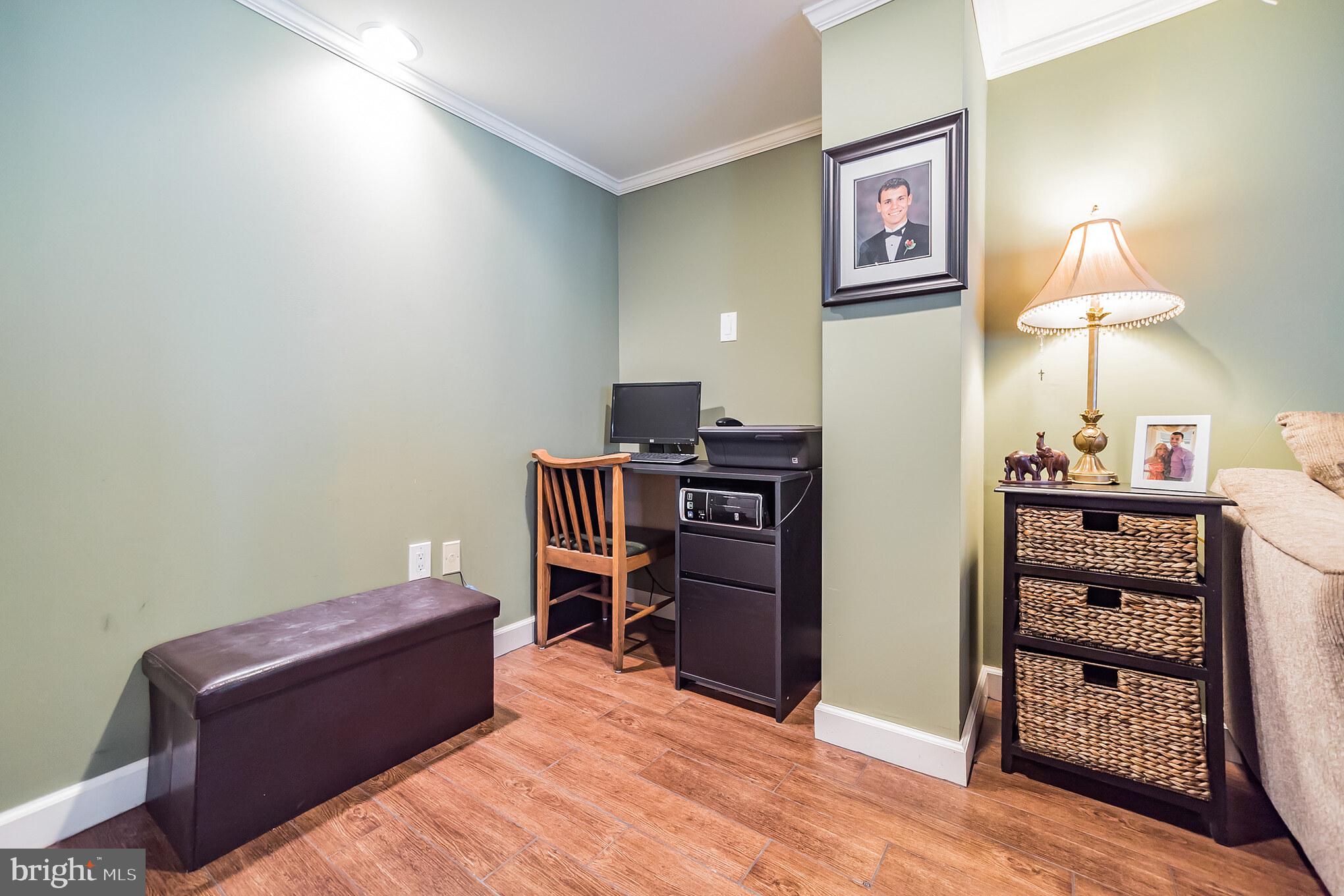 12817 Cabell Road Philadelphia, PA 19154 - Photo 24 of 30 a room with furniture and a window