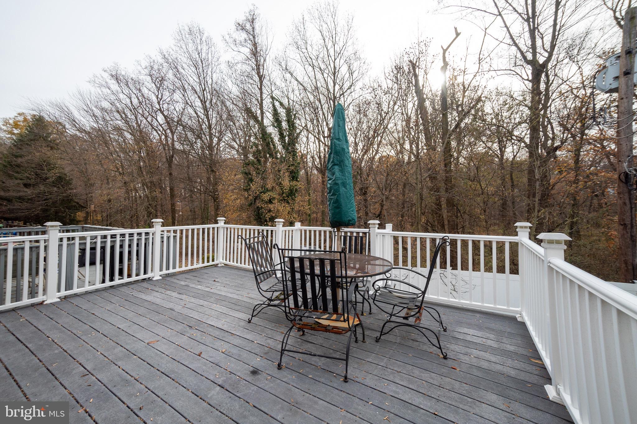 12817 Cabell Road Philadelphia, PA 19154 - Photo 29 of 30 a view of a wooden deck with furniture