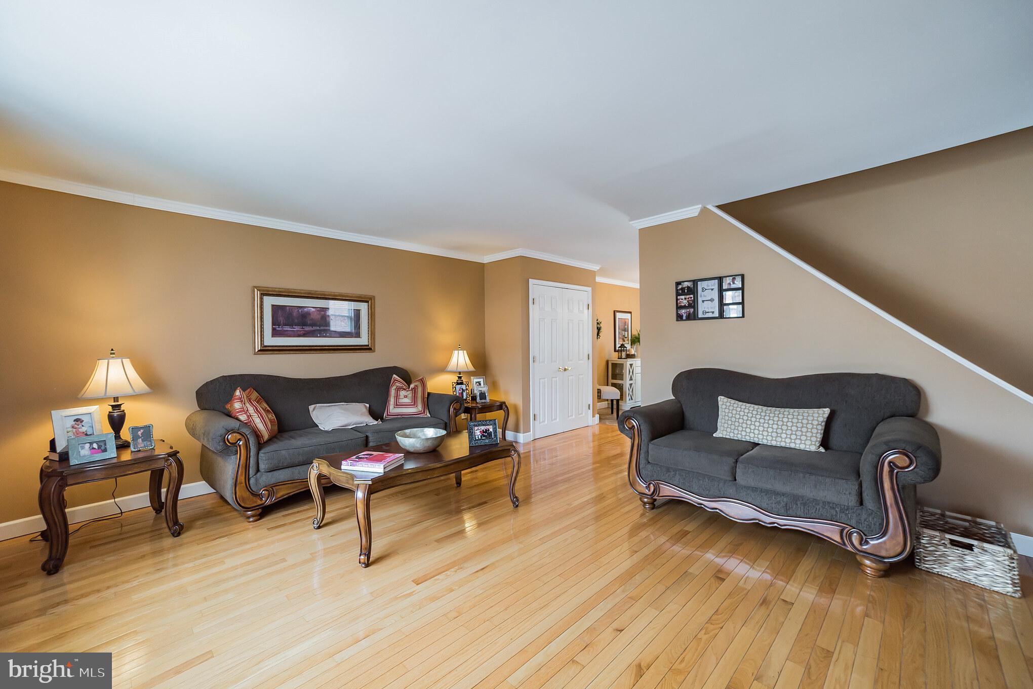 12817 Cabell Road Philadelphia, PA 19154 - Photo 6 of 30 a living room with furniture and a wooden floor