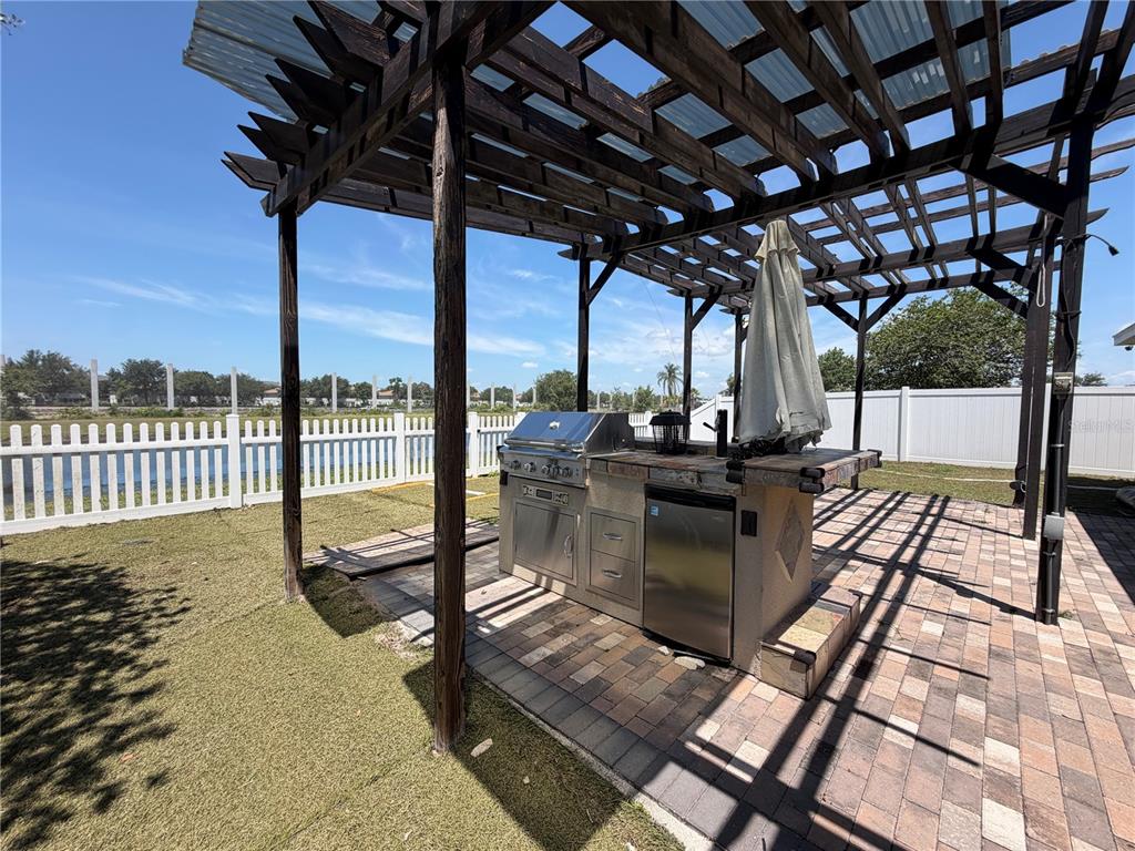 945 Tramells Trail Kissimmee, FL 34744 - Photo 29 of 36 a view of a porch with furniture