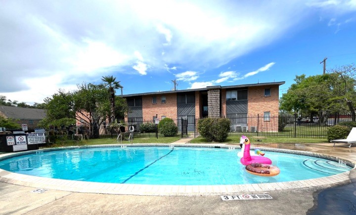 3304 Red River Street, Unit 102 Austin, TX 78705 - Photo 11 of 15 a view of yard with swimming pool and outdoor seating
