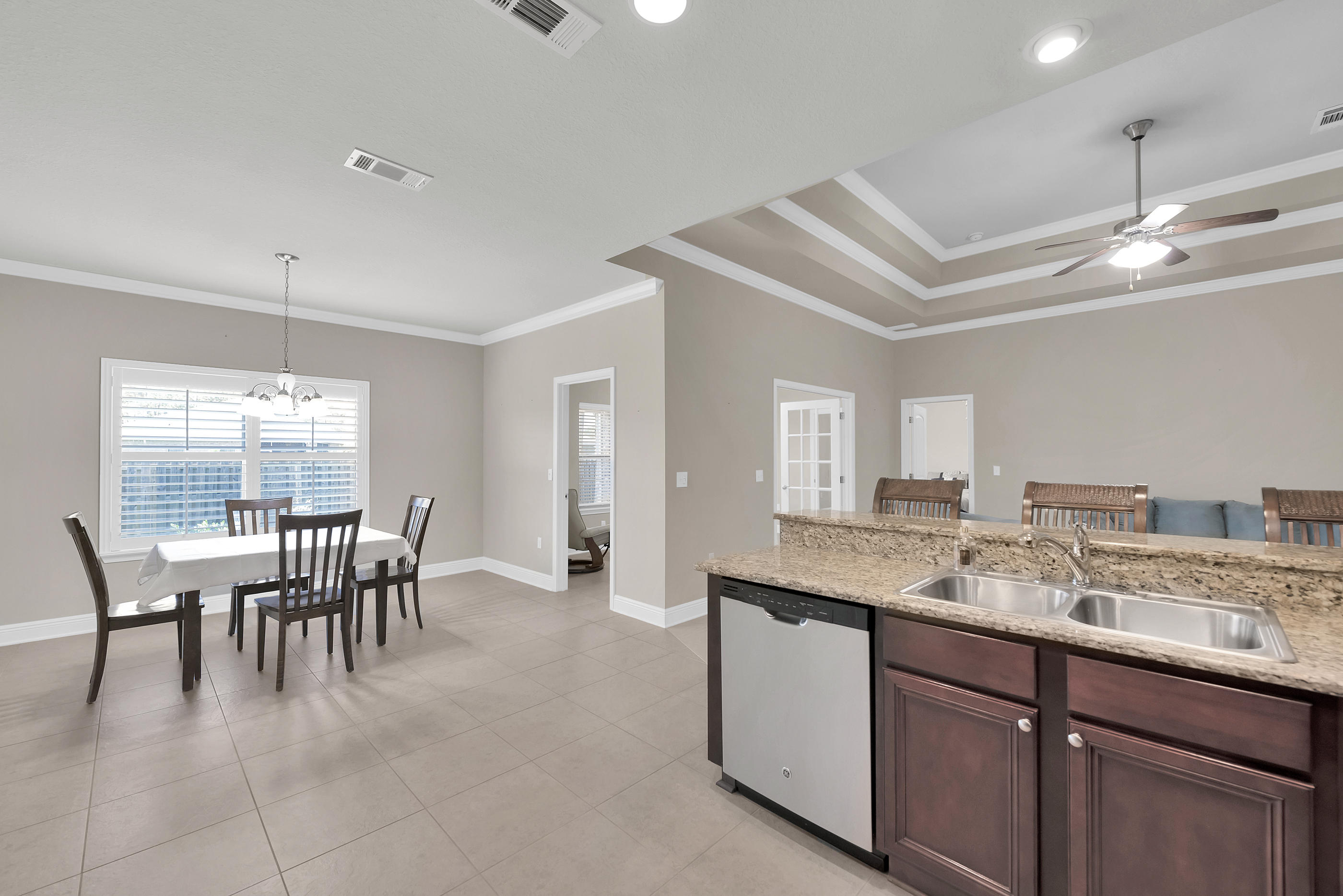 304 Pin Oak Loop Santa Rosa Beach, FL 32459 - Photo 6 of 22 a view of a dining room with furniture
