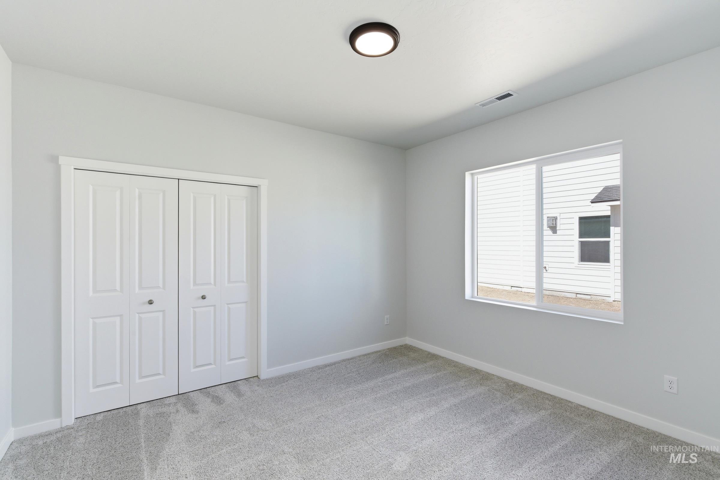 13663 Redway Court Caldwell, ID 83607 - Photo 20 of 32 Light gray walls with coordinating carpet