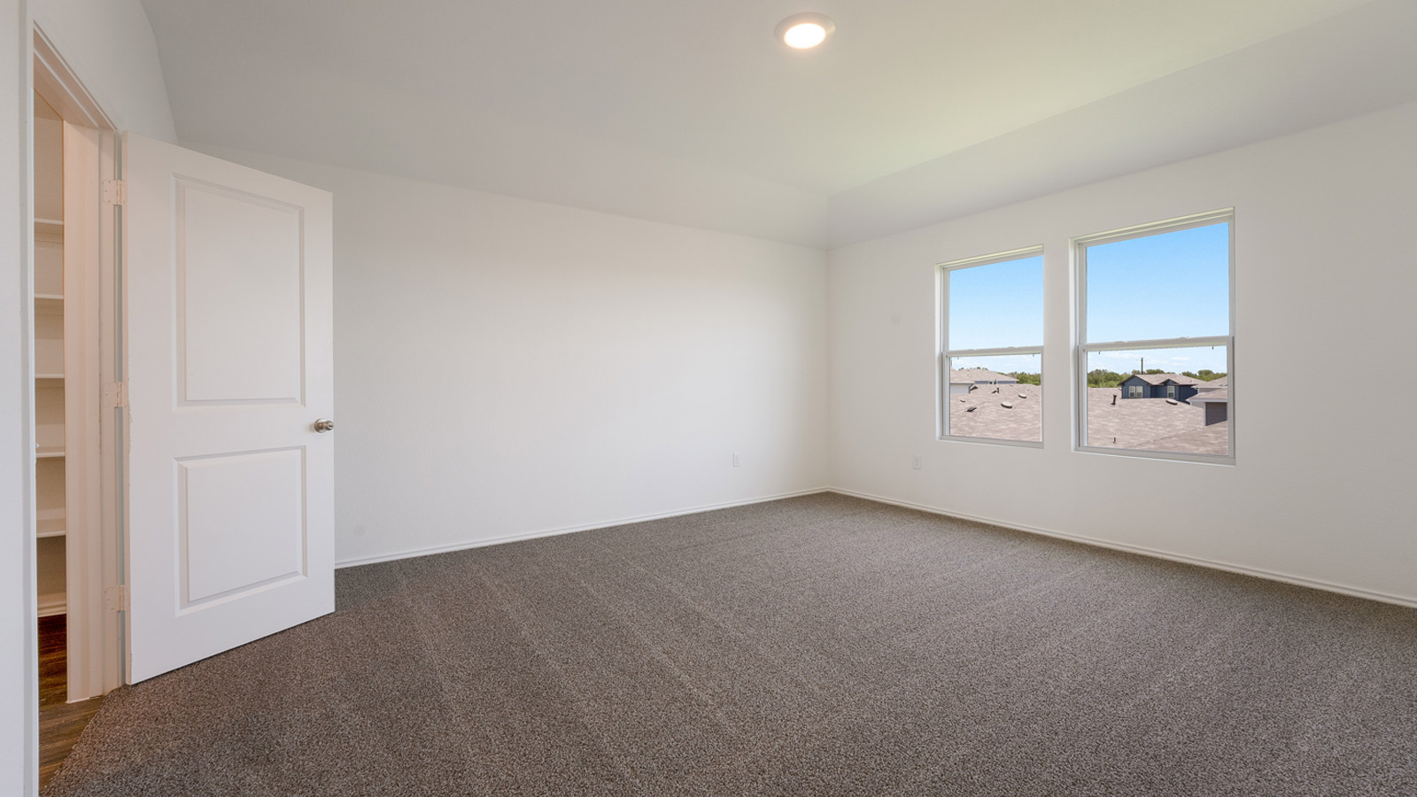 12105 Pike Bend Mustang Ridge, TX 78610 - Photo 12 of 21 an empty room with windows