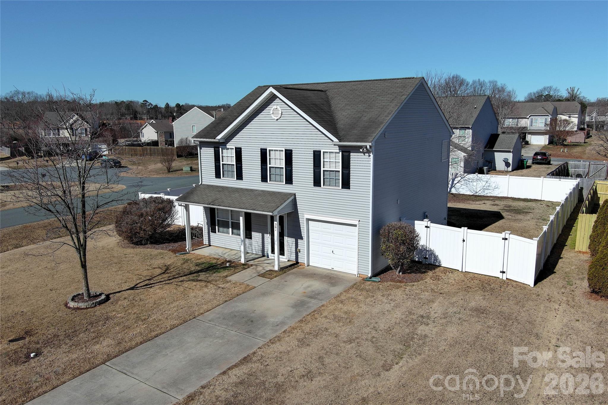 301 Foster Lane Albemarle, NC 28001 - Photo 1 of 41 a front view of a house with a yard