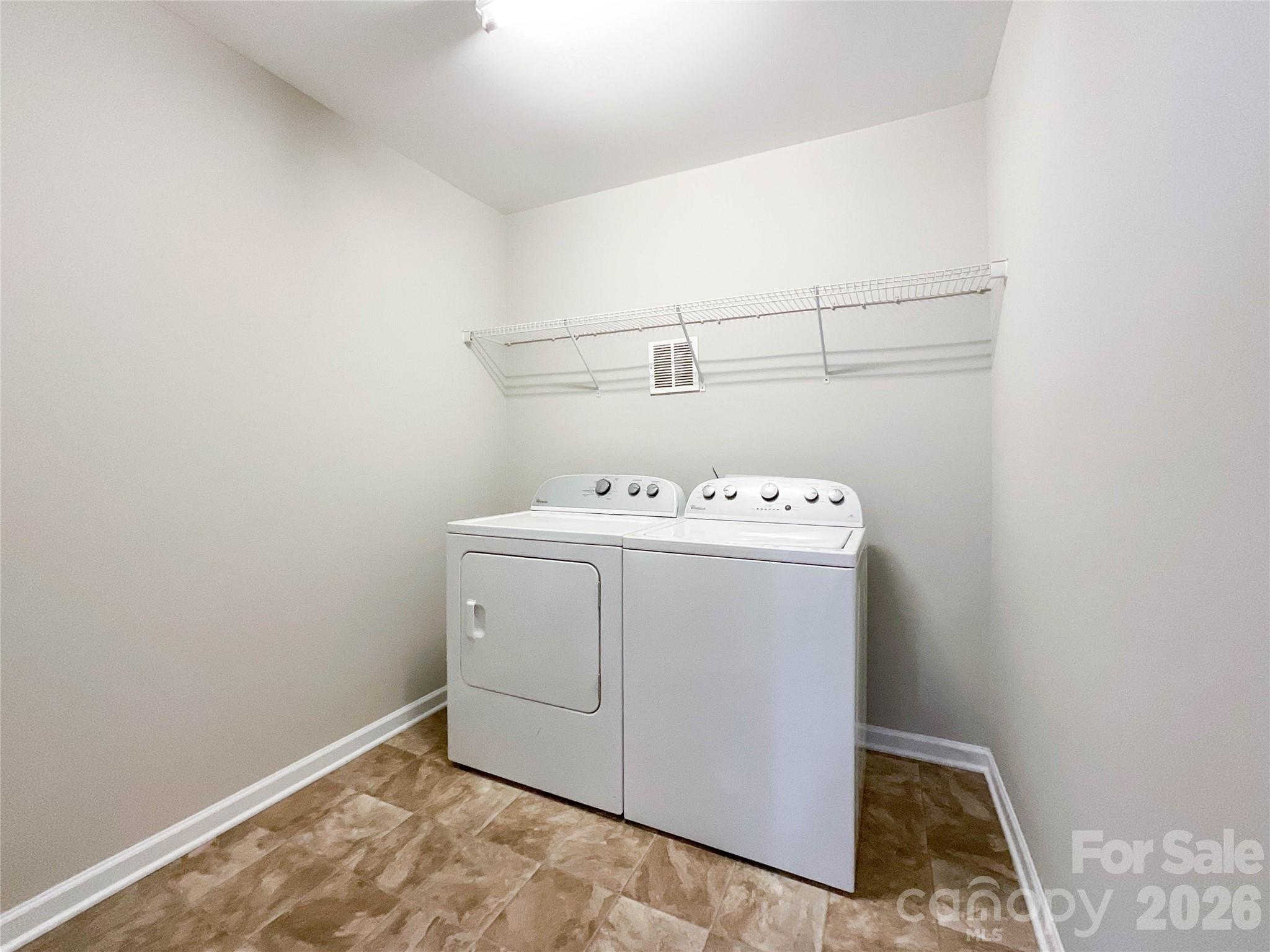 301 Foster Lane Albemarle, NC 28001 - Photo 18 of 41 a utility room with dryer and washer