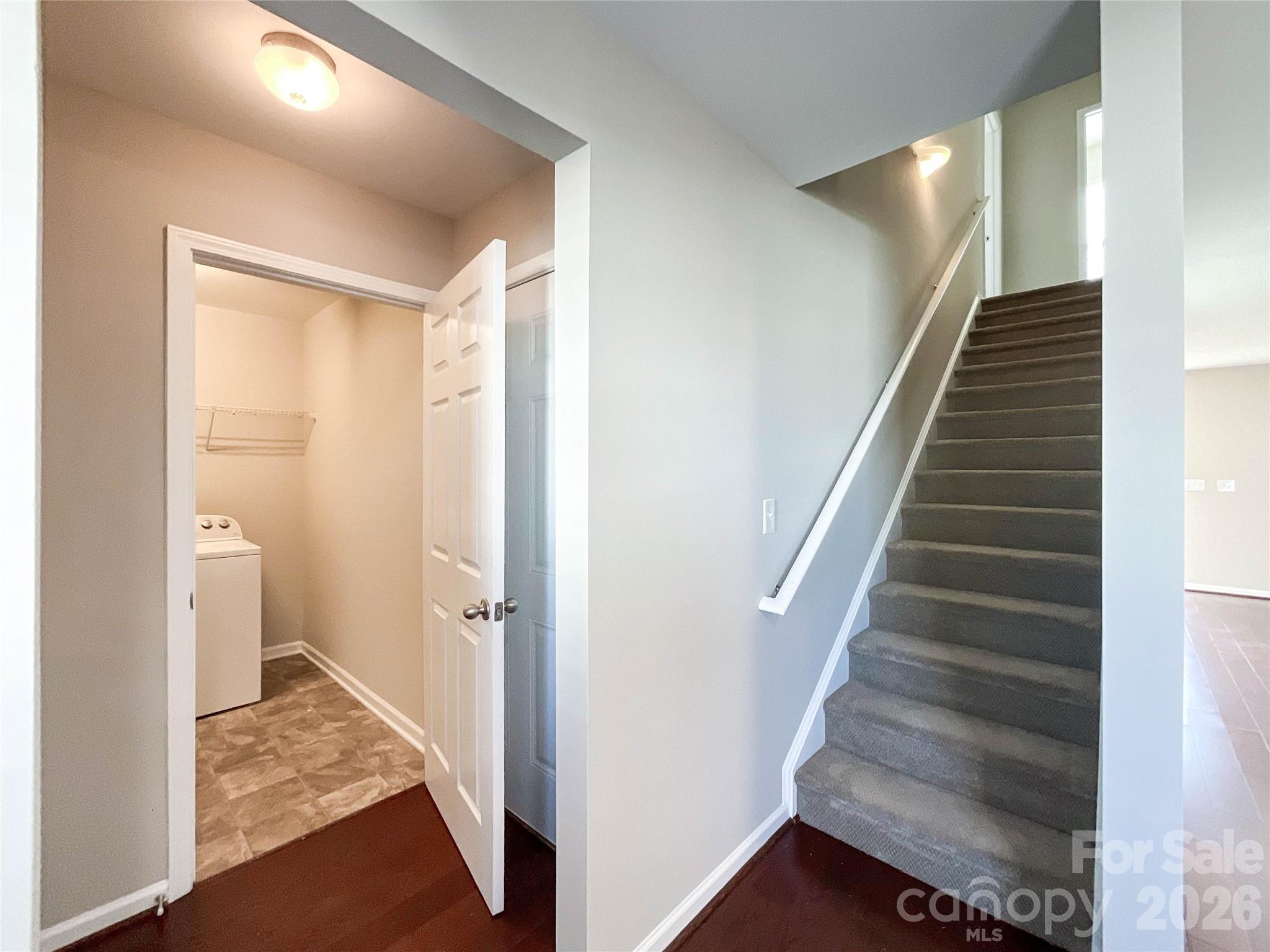 301 Foster Lane Albemarle, NC 28001 - Photo 20 of 41 a view of entryway with stairs and wooden floor
