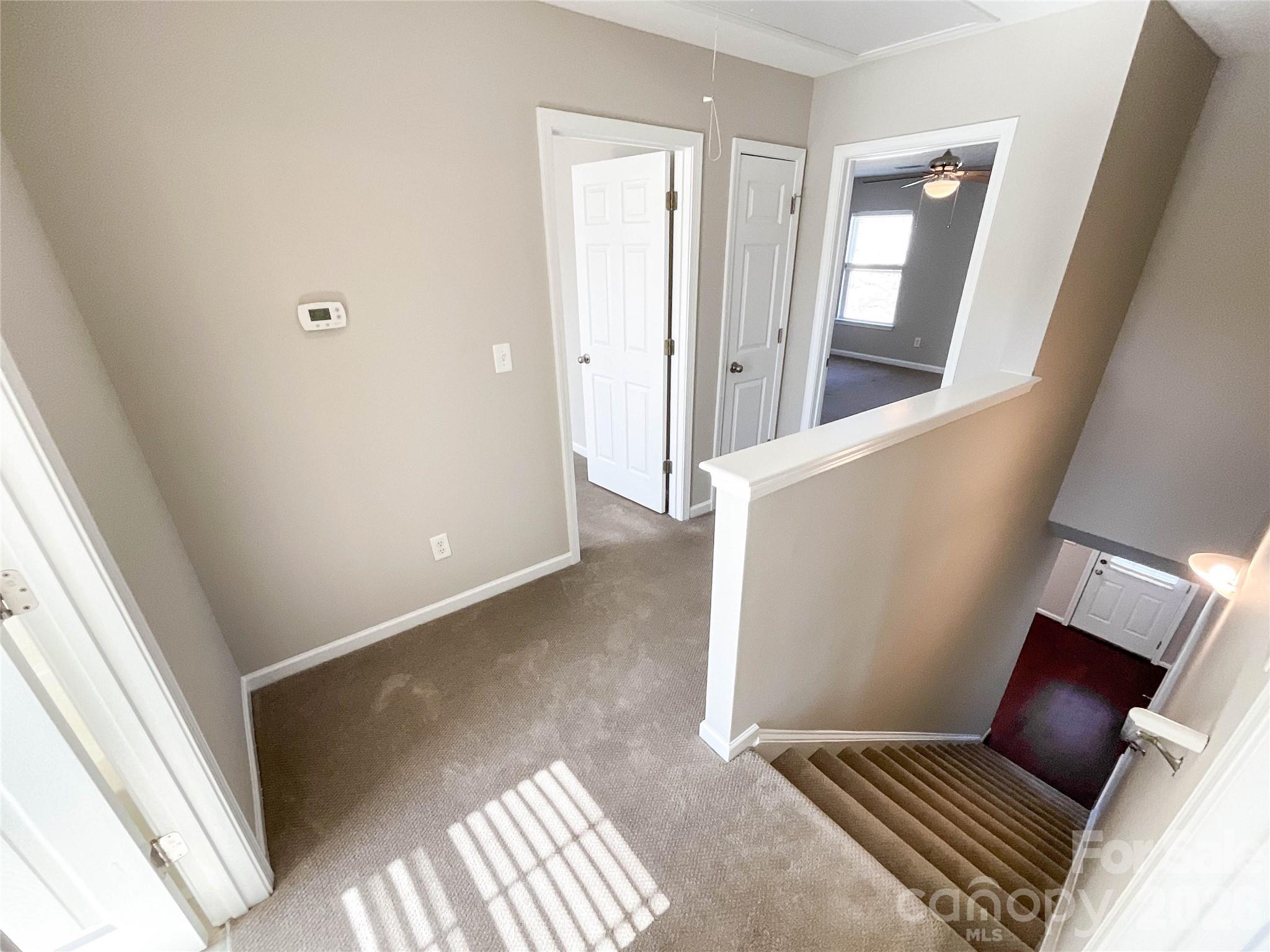 301 Foster Lane Albemarle, NC 28001 - Photo 21 of 41 a view of an empty room and wooden floor