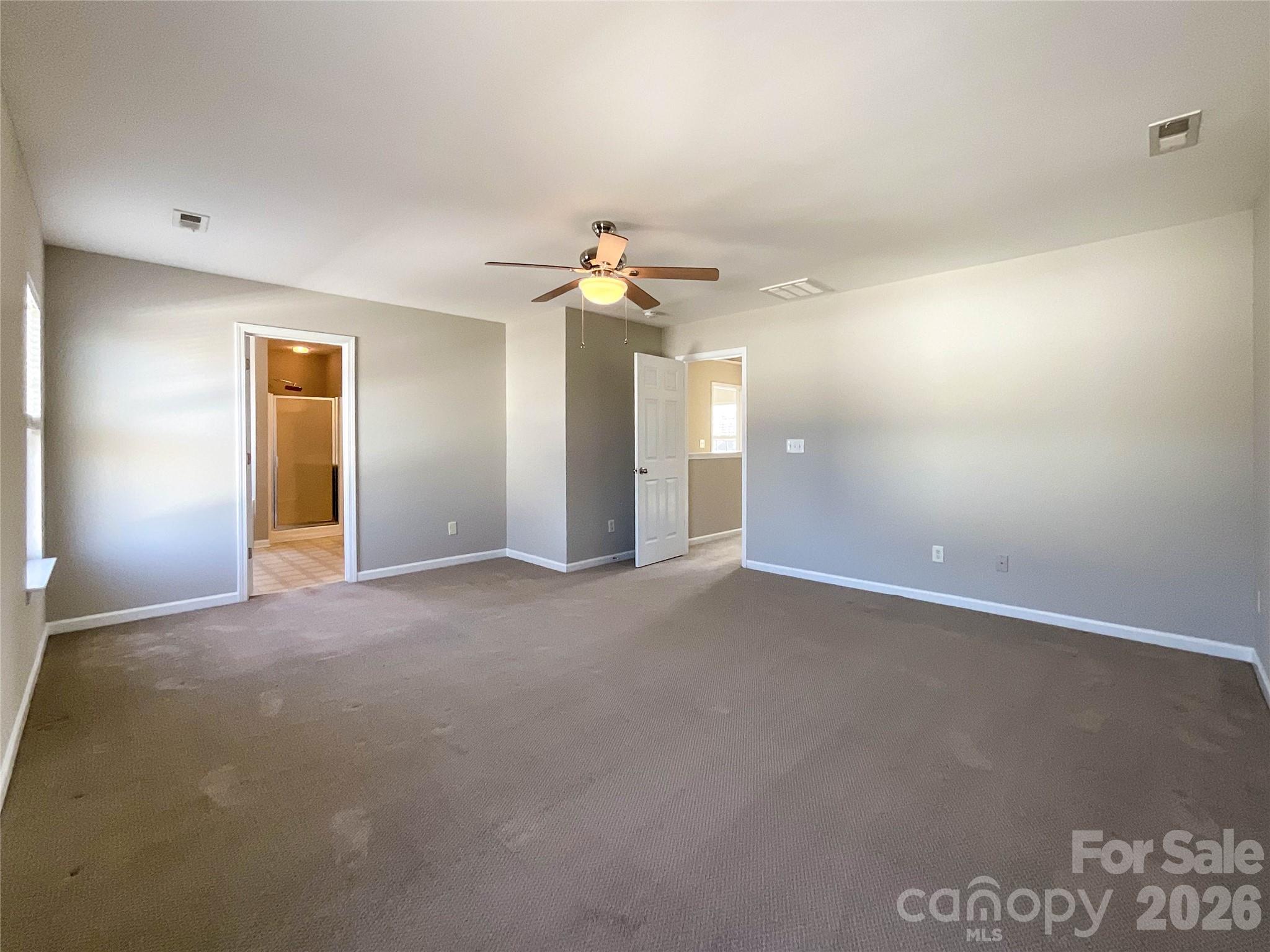 301 Foster Lane Albemarle, NC 28001 - Photo 24 of 41 a view of a room with a ceiling fan and window