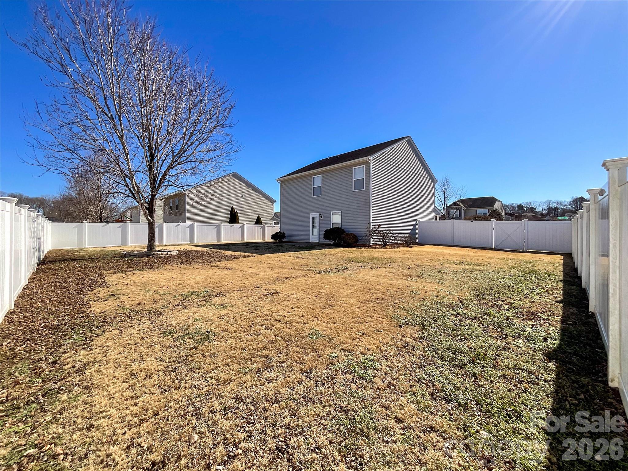 301 Foster Lane Albemarle, NC 28001 - Photo 35 of 41 a large house with a large tree in front of it