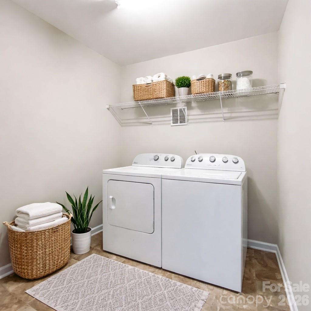 301 Foster Lane Albemarle, NC 28001 - Photo 10 of 41 a utility room with dryer and washer