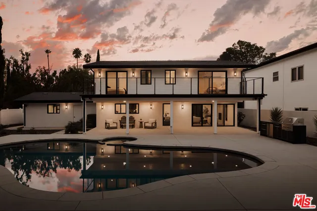 a view of a house with roof deck