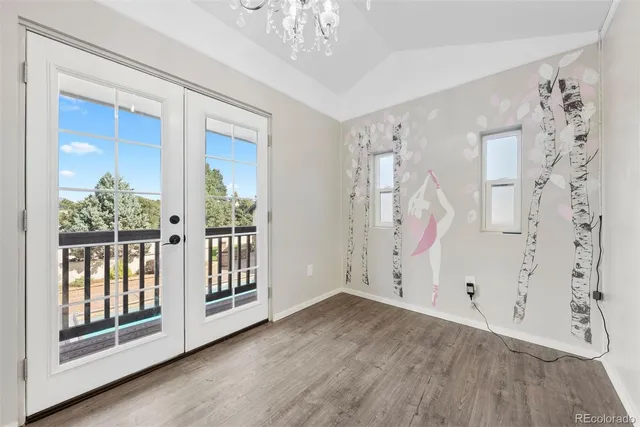 a view of entryway with wooden floor