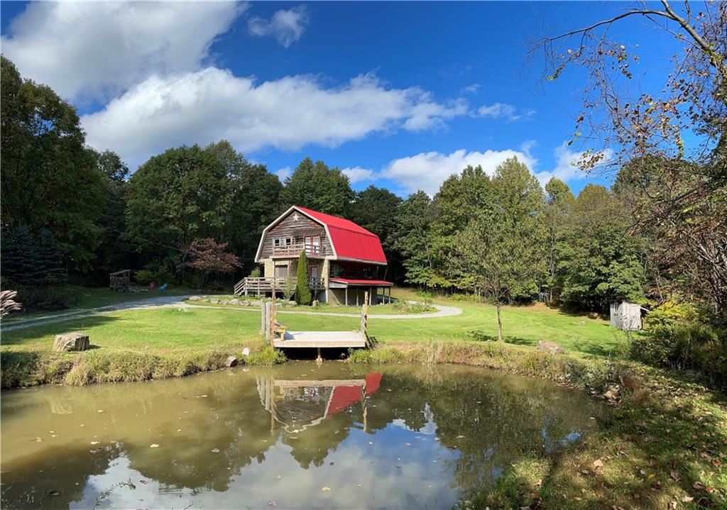 401 Bear Rocks Road Acme, PA 15610 - Photo 2 of 25 a view of swimming pool of a house with a yard
