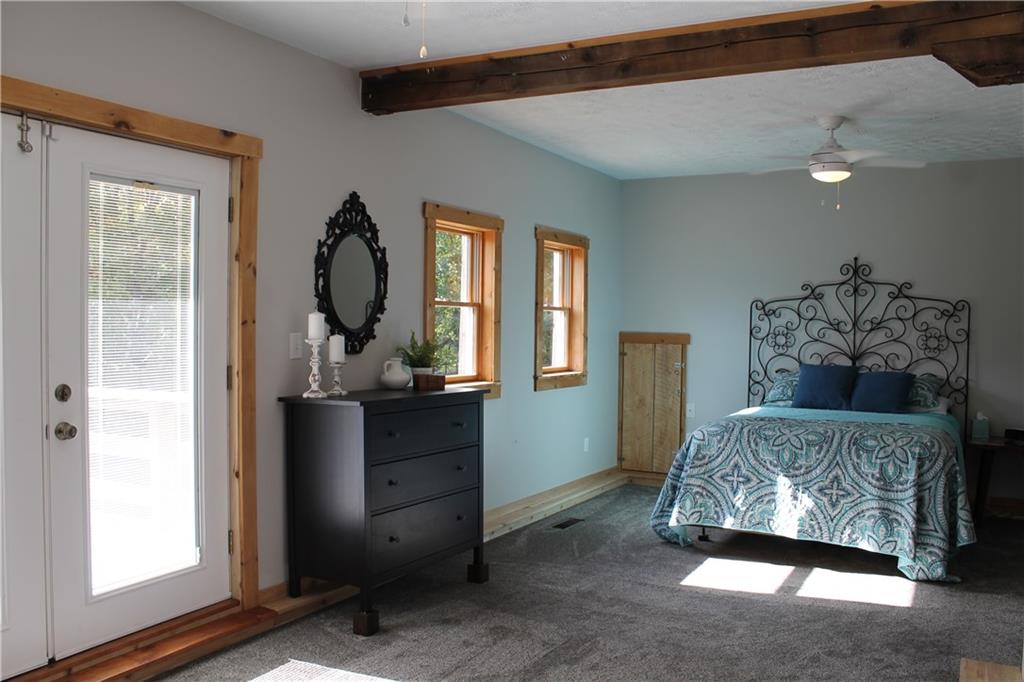 401 Bear Rocks Road Acme, PA 15610 - Photo 12 of 25 a living room with furniture and a window