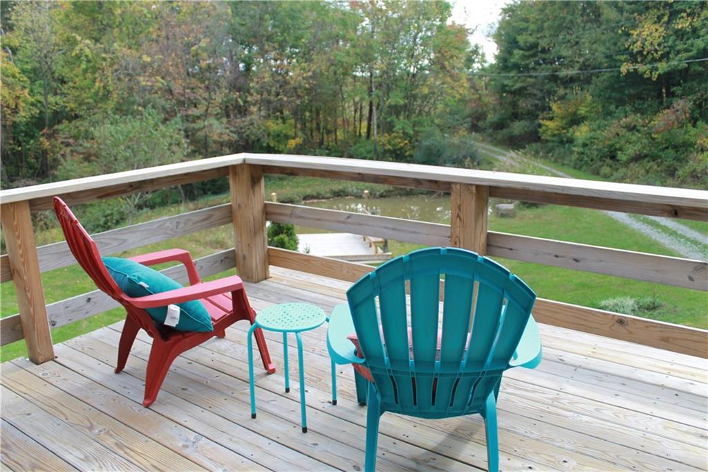 401 Bear Rocks Road Acme, PA 15610 - Photo 15 of 25 a view of a chairs and table on the balcony