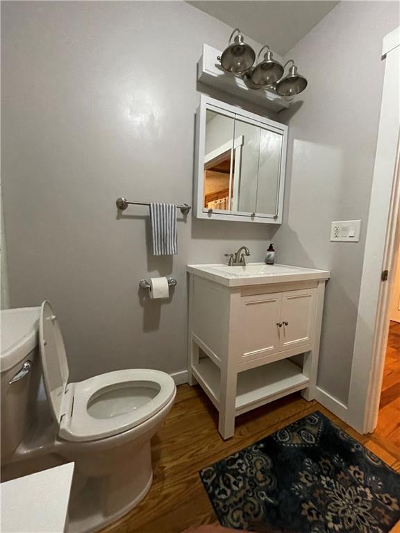401 Bear Rocks Road Acme, PA 15610 - Photo 9 of 25 a bathroom with a sink toilet and mirror