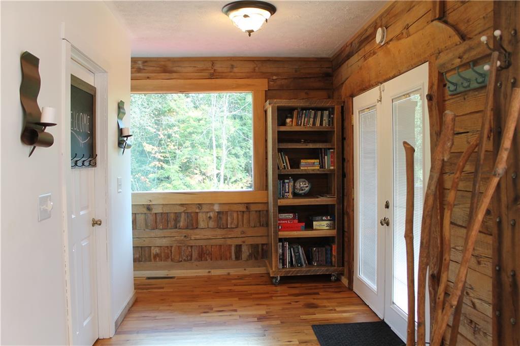 401 Bear Rocks Road Acme, PA 15610 - Photo 10 of 25 a view of walk in closet with clothes and shoes