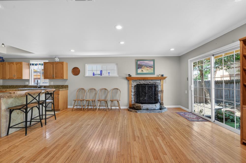 10653 Campana Way Rancho Cordova, CA 95670 - Photo 12 of 49 a living room with furniture and a fireplace