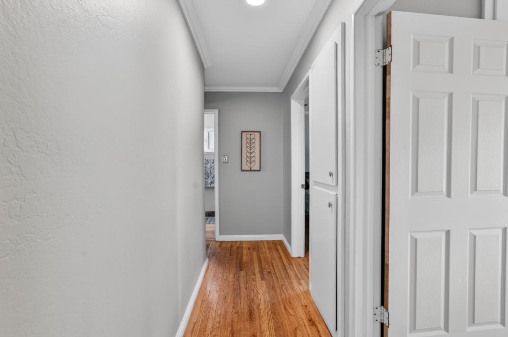 10653 Campana Way Rancho Cordova, CA 95670 - Photo 23 of 49 a view of a hallway with wooden floor and entryway