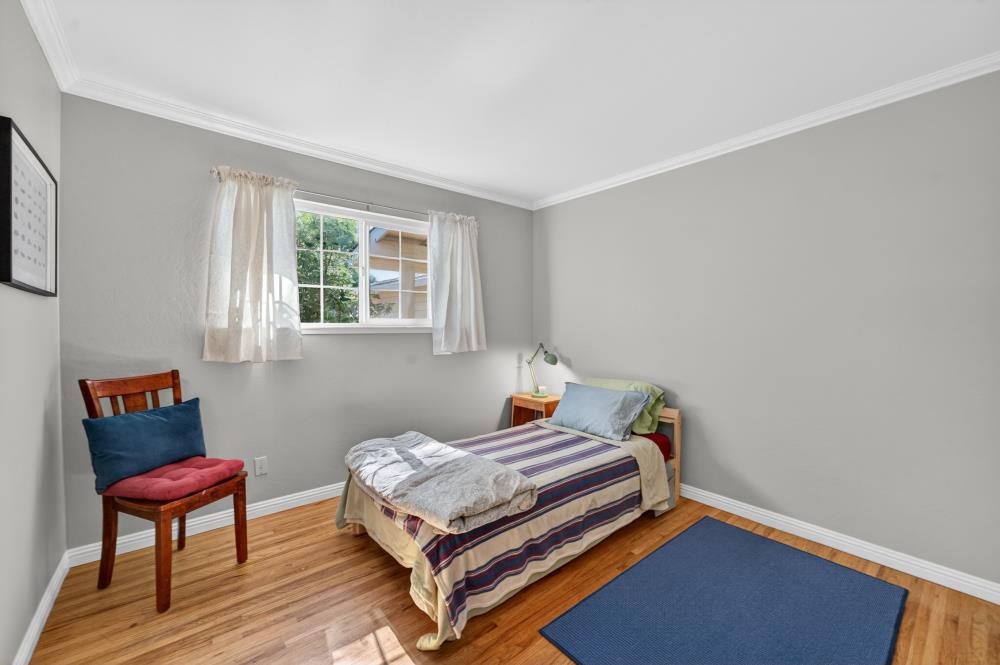 10653 Campana Way Rancho Cordova, CA 95670 - Photo 24 of 49 a bedroom with a bed and a chair in it