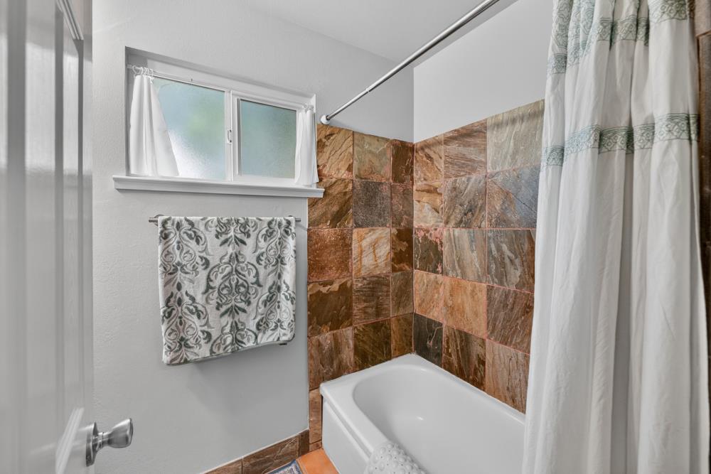 10653 Campana Way Rancho Cordova, CA 95670 - Photo 28 of 49 a bathroom with a shower and a toilet