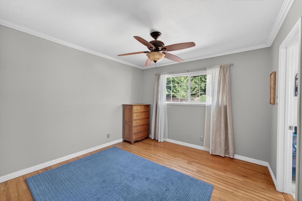 10653 Campana Way Rancho Cordova, CA 95670 - Photo 31 of 49 wooden floor in an empty room with a window