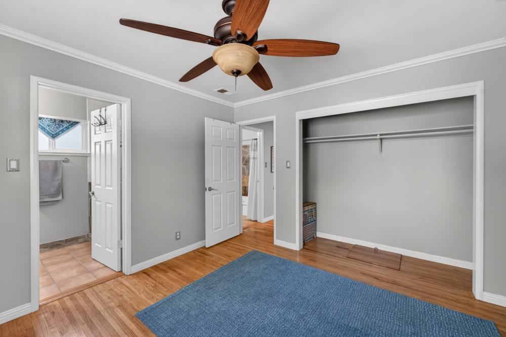 10653 Campana Way Rancho Cordova, CA 95670 - Photo 32 of 49 a view of empty room with wooden floor