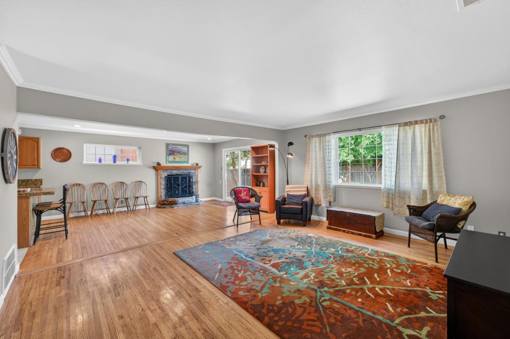 10653 Campana Way Rancho Cordova, CA 95670 - Photo 7 of 49 a living room with furniture and wooden floor